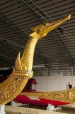 Suphannahongse (Suphannahong), the King's personal barge, was carved out of one teak tree and completed in 1911.<br/><br/>

Thailand's royal barges have been used in ceremonies on Bangkok's Chao Phraya River since the 18th century, but were also used prior to this period in the Ayutthayan era.<br/><br/>

The exquisitely crafted Royal Barges are a blend of craftsmanship and traditional Thai art. The Royal Barge Procession takes place rarely, typically coinciding with only the most significant cultural and religious events. During the reign of King Bhumibol Adulyadej spanning over 60 years the Procession has only occurred 16 times.<br/><br/>

The Royal Barge Procession, in the present, consists of 52 barges (51 historical Barges, and the Royal Barge the Narai Song Suban King Rama IX, built in 1994 and the only Barge built during King Bhumibol's reign) and is manned by 2,082 oarsmen. The Procession proceeds down the Chao Phraya River, from the Wasukri Royal Landing Place in Khet Dusit, Bangkok, passes the Temple of the Emerald Buddha, The Grand Palace, Wat Po and finally arrives at Wat Arun (Temple of the Dawn).