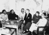 Conference at Yenan Communist Headquarters. Central figures are U.S. Ambassador Patrick J. Hurley, Col. I.V. Yeaton, U.S. Army Observer, Mao Zedong, Zhu De and Zhou Enlai.